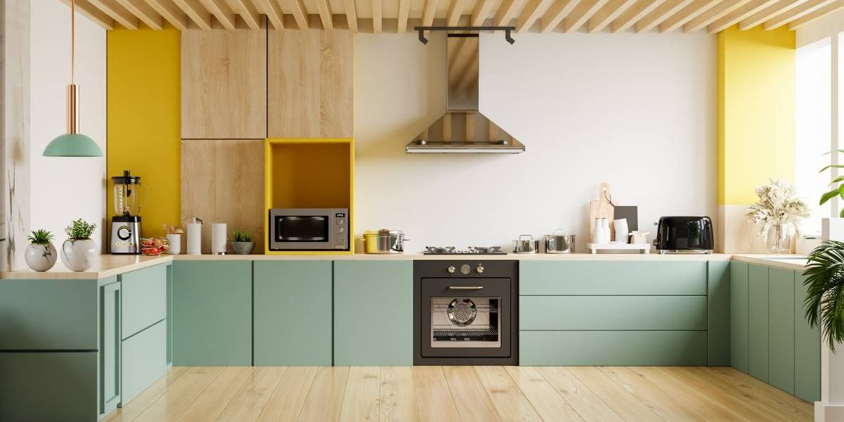 a modern kitchen with yellow and green cabinets