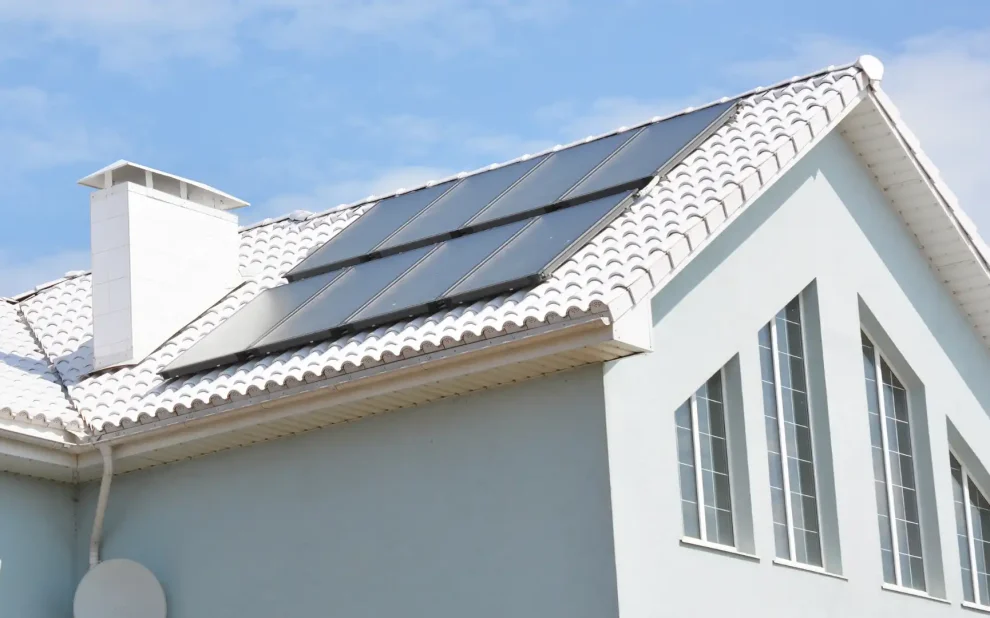 an energy efficient house with solar panels on the roof