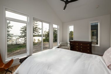 lake view from the bedroom - Photo from our custom home built project - Loughborough Lake New Home Build in South Frontenac, Ontario