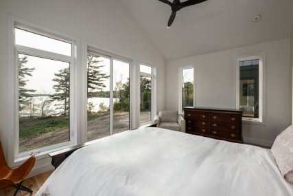 lake view from the bedroom - Photo from our custom home built project - Loughborough Lake New Home Build in South Frontenac, Ontario