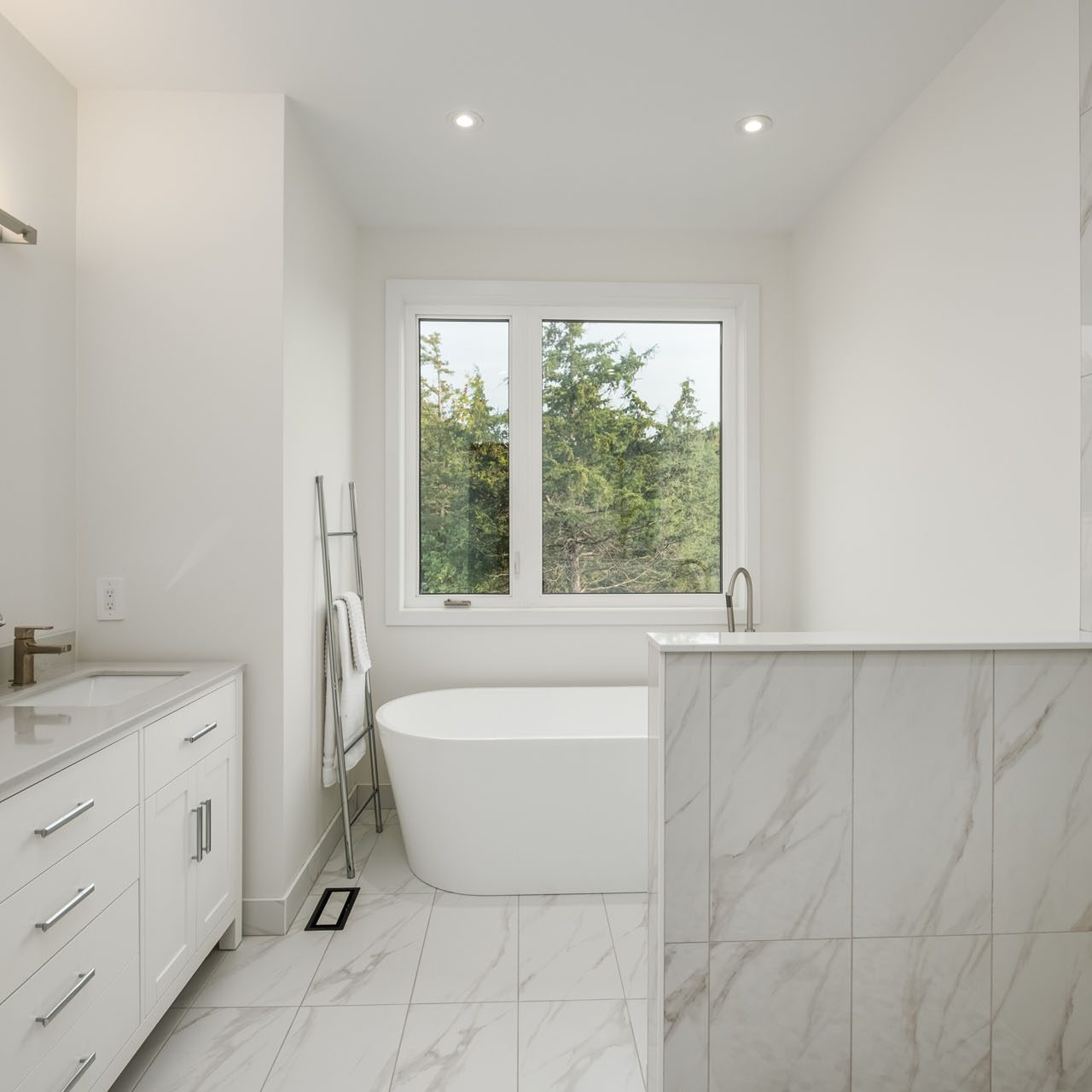 modern full bathroom with marbled walls - project by Your Kingston contractor