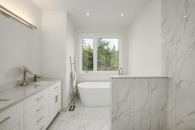 modern full bathroom with marbled walls - project by Your Kingston contractor