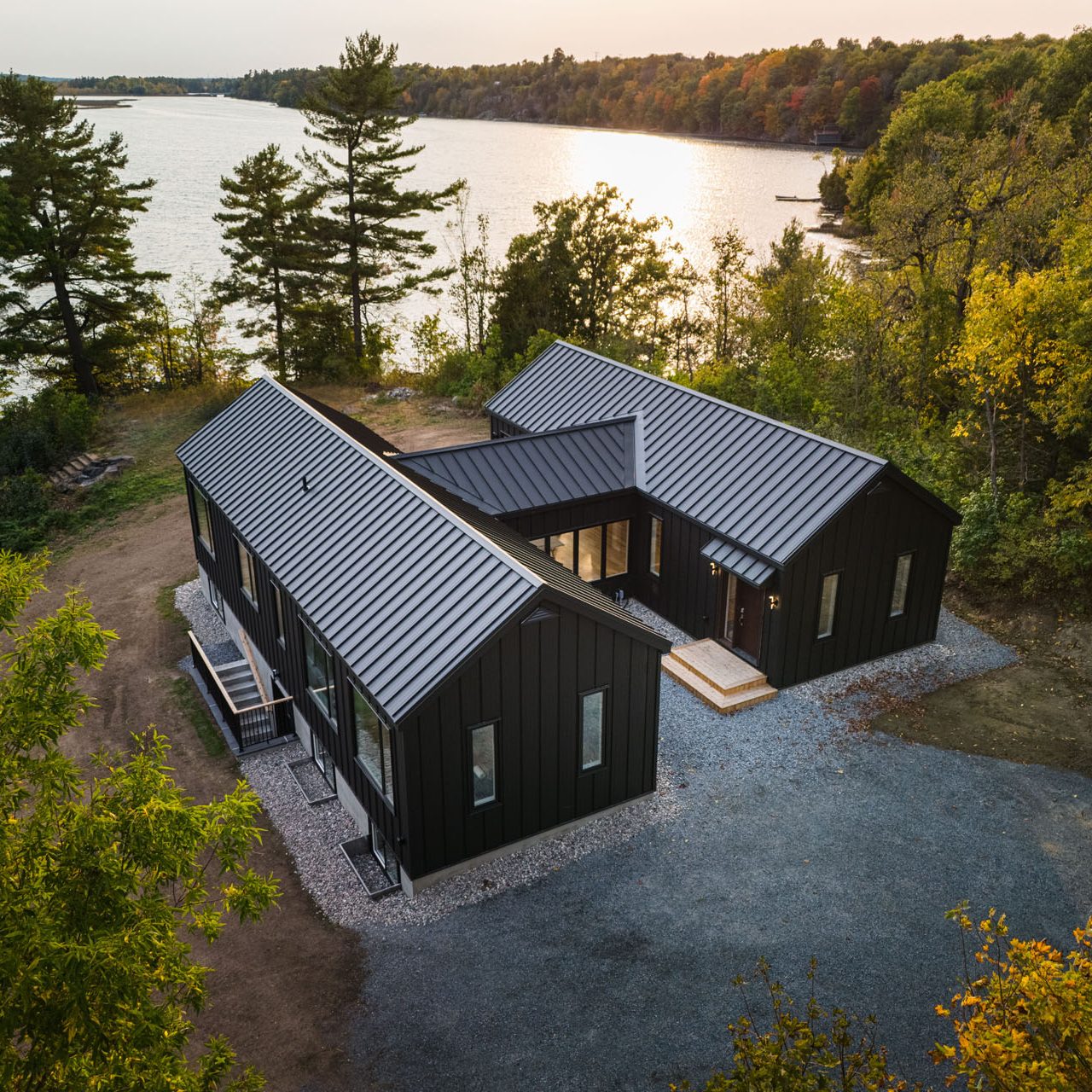 birds eye view, against Lake Loughborough - Photo from our custom home built project - Loughborough Lake New Home Build in South Frontenac, Ontario
