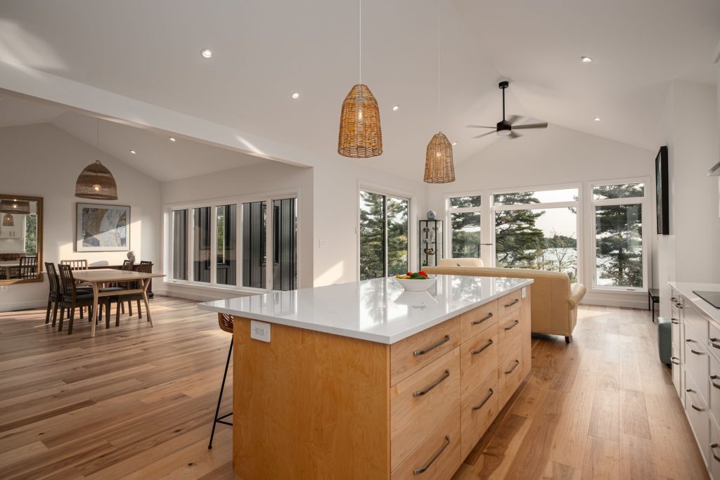 kitchen view with large oak and White Island - Photo from our custom home built project - Loughborough Lake New Home Build in South Frontenac, Ontario custom home 