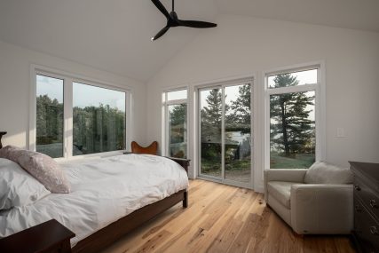 lake view from the bedroom - Photo from our custom home built project - Loughborough Lake New Home Build in South Frontenac, Ontario