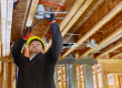 contractor fixing the electrical space and wiring for lighting